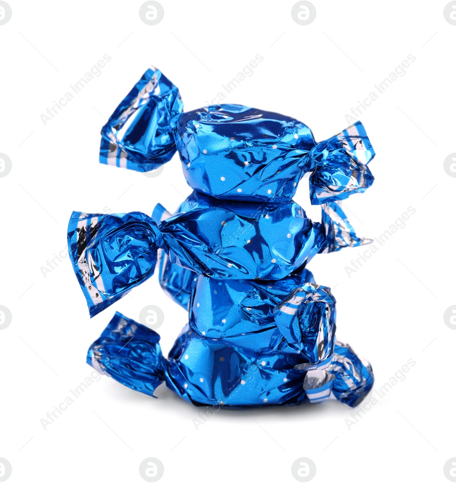 Photo of Candies in light blue wrappers isolated on white