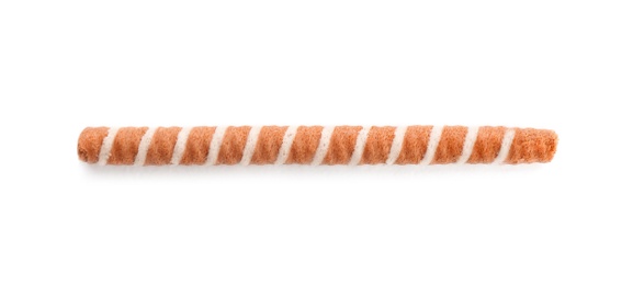 Delicious chocolate wafer roll on white background, top view. Sweet food