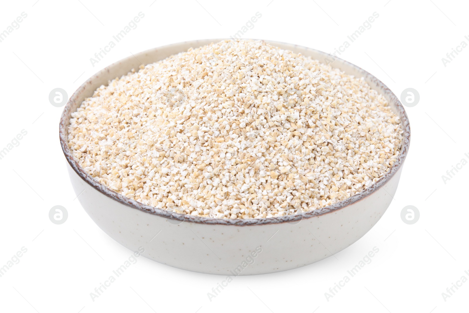 Photo of Dry barley groats in bowl isolated on white