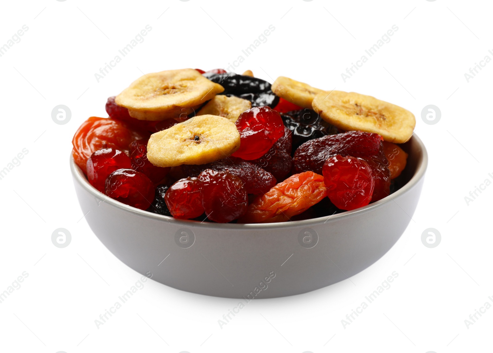 Photo of Mix of delicious dried fruits in bowl isolated on white