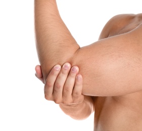 Photo of Man suffering from elbow pain on white background, closeup