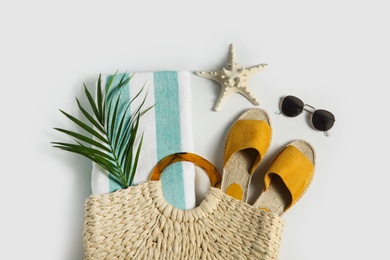 Photo of Composition with stylish beach accessories on white background, top view