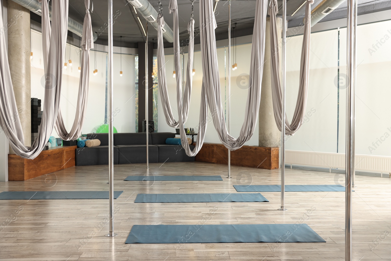 Photo of Many hammocks for fly yoga in studio