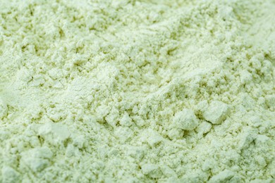 Photo of Natural celery powder as background, closeup view