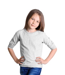 Photo of Little girl in long sleeve t-shirt on white background. Mockup for design