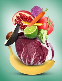 Image of Stack of different vegetables and fruits on pale light teal background