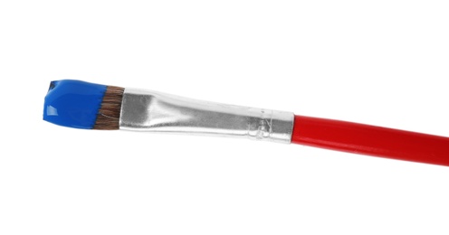 Photo of Brush with color paint on white background, top view