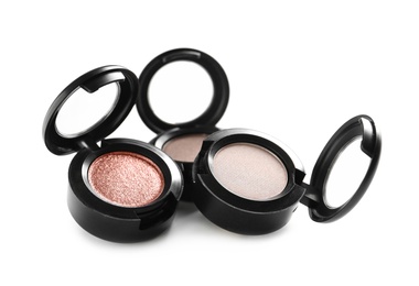 Photo of Different eye shadows on white background. Decorative cosmetics