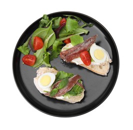 Photo of Delicious bruschettas with anchovies, cream cheese, eggs and tomatoes isolated on white, top view