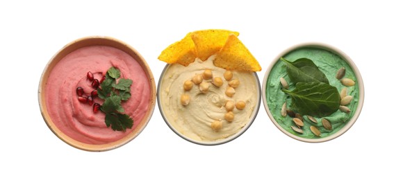 Photo of Different kinds of tasty hummus in bowls on white background, top view