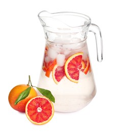 Delicious refreshing drink with sicilian orange and ice cubes in jug isolated on white