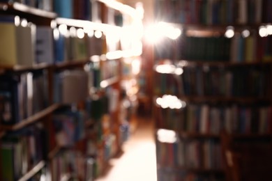 Blurred view of different books on shelves in library