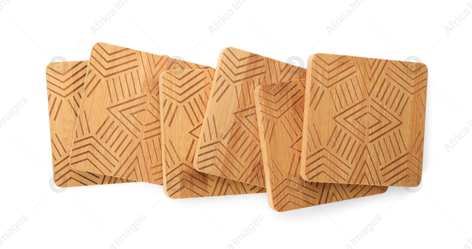 Photo of Wooden cup coasters on white background, top view