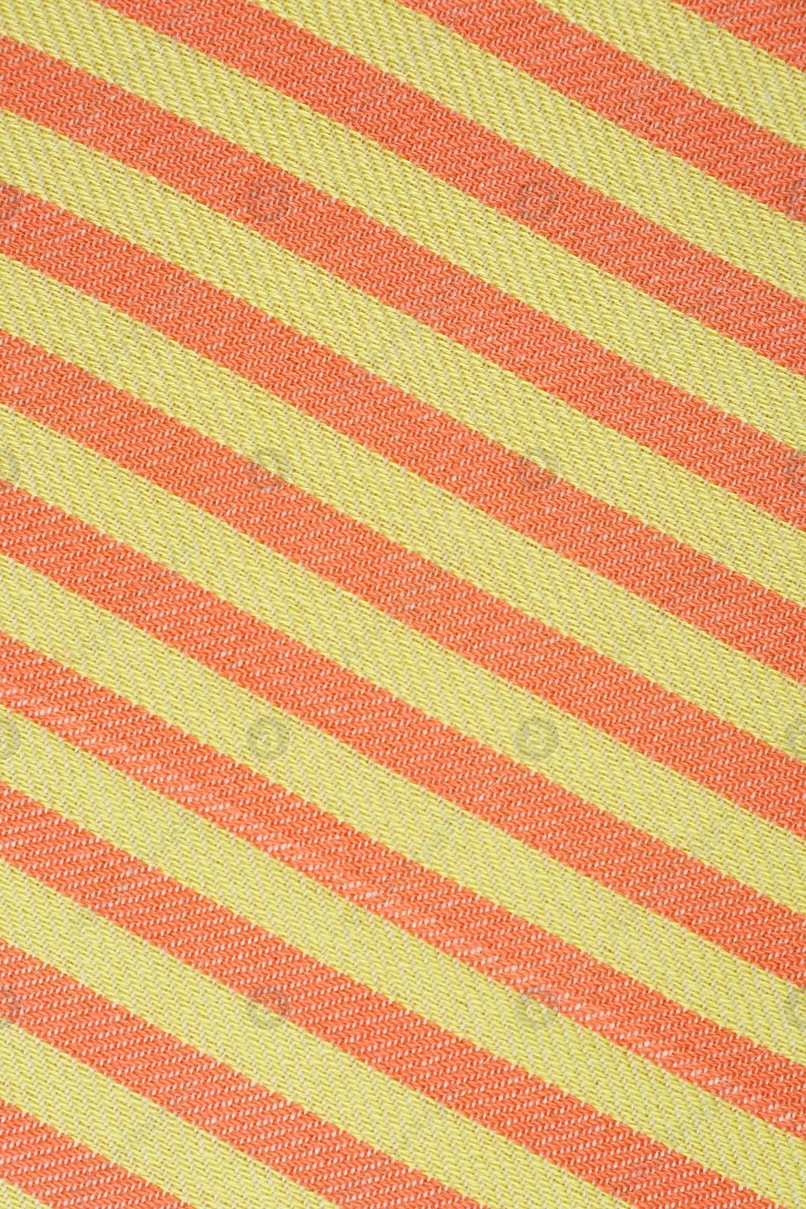 Photo of Striped beach towel as background, top view