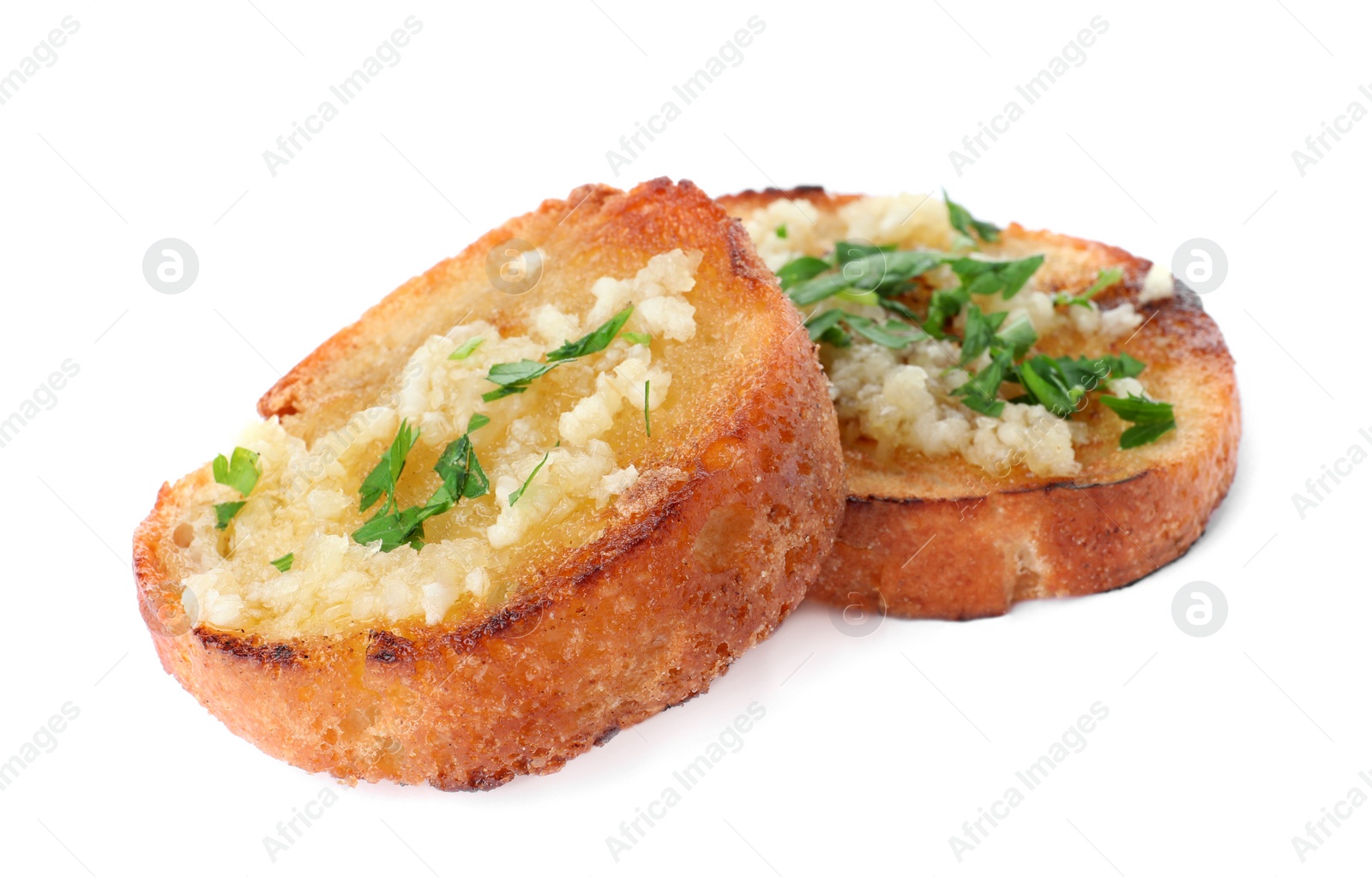 Photo of Slices of toasted bread with garlic and herb on white background