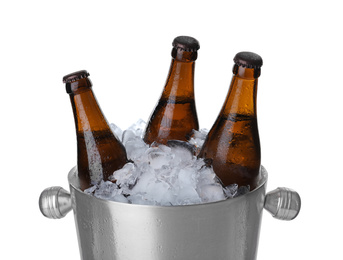 Metal bucket with beer and ice cubes isolated on white