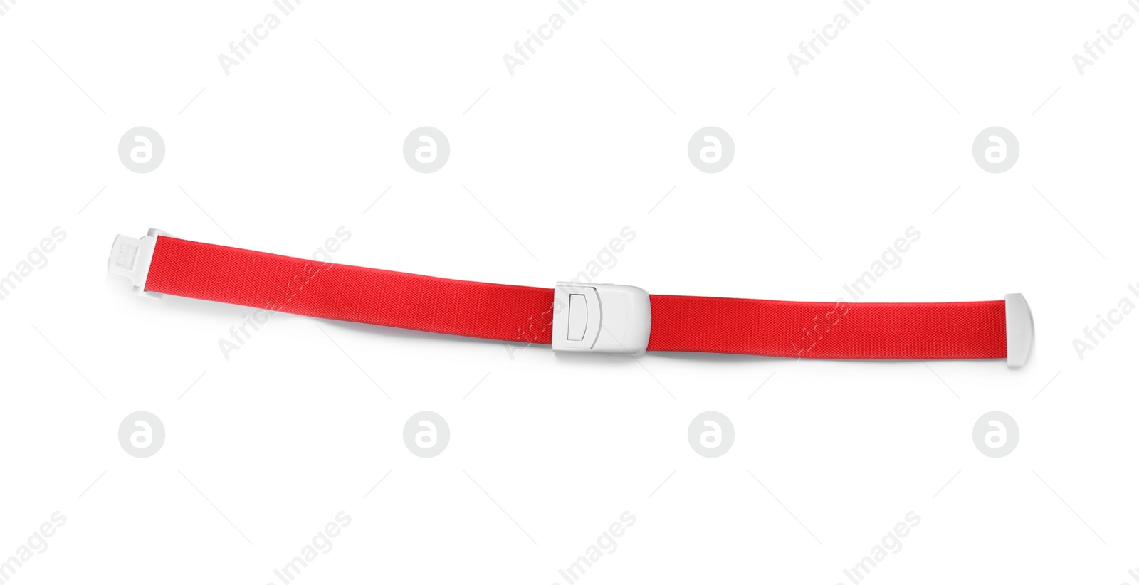 Photo of First aid tourniquet on white background, top view. Medical equipment