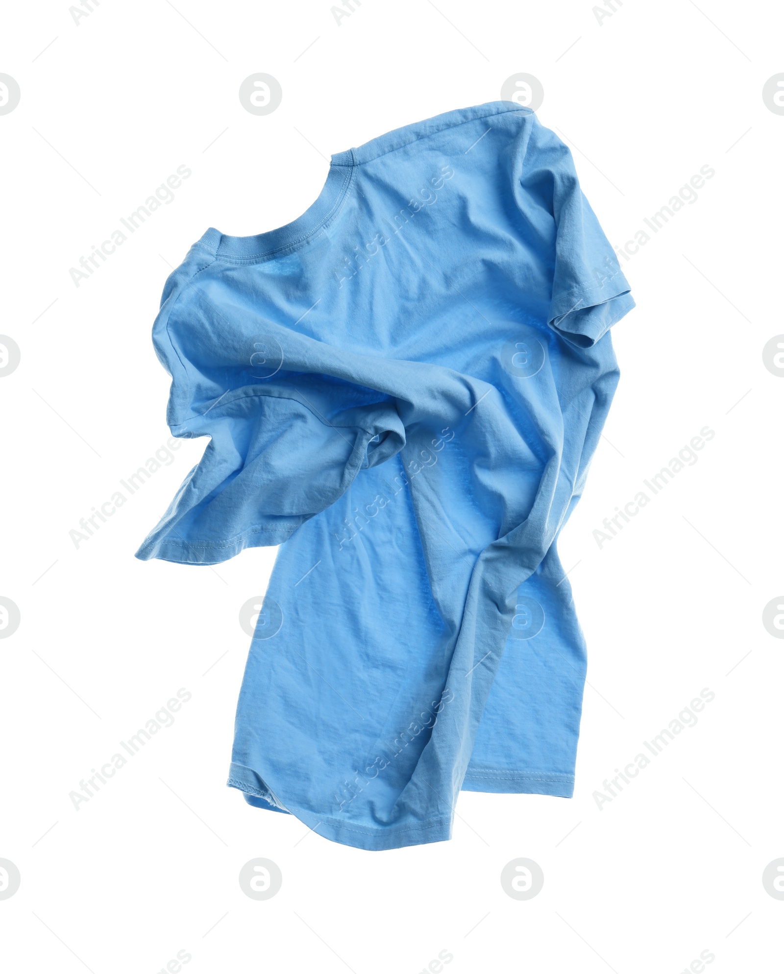 Photo of Rumpled light blue t-shirt isolated on white