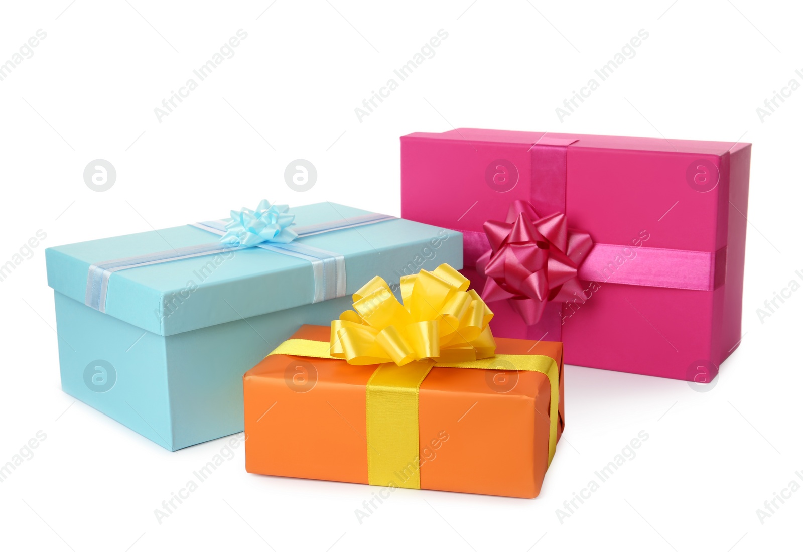 Photo of Colorful gift boxes with bows on white background