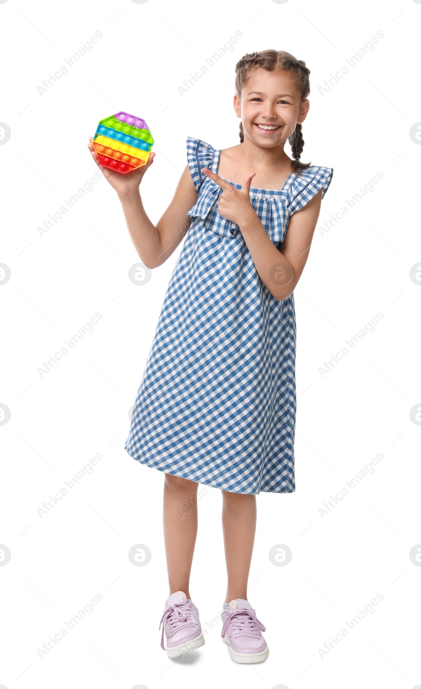 Photo of Girl with pop it fidget toy on white background