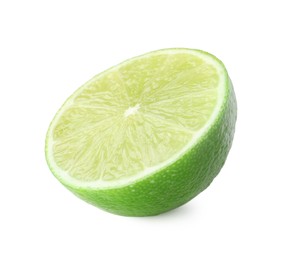 Photo of Half of fresh green ripe lime isolated on white