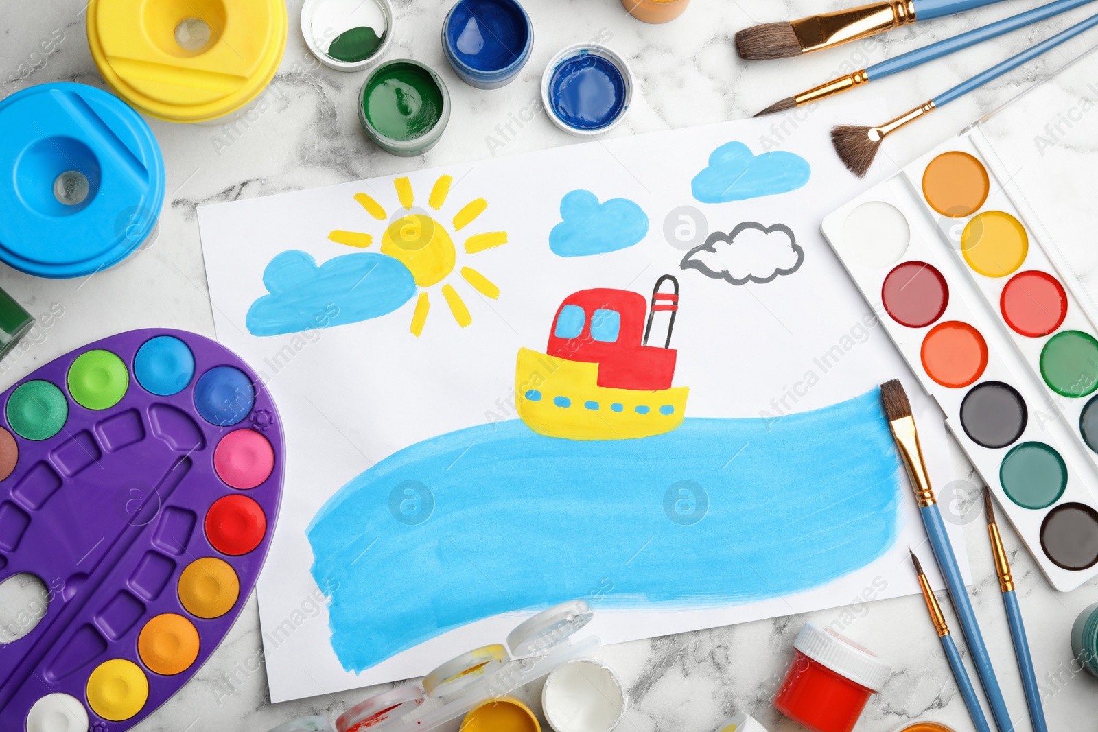 Photo of Flat lay composition with child's painting of ship on white marble table