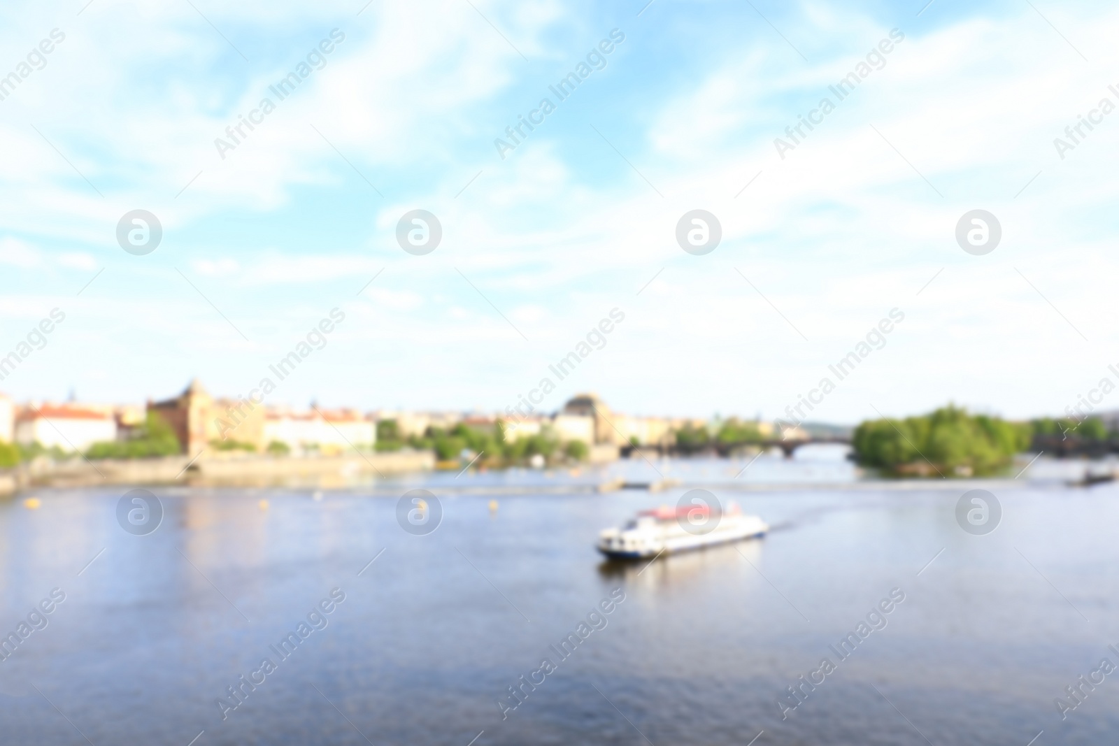 Photo of PRAGUE, CZECH REPUBLIC - APRIL 25, 2019: Blurred cityscape with Vltava river