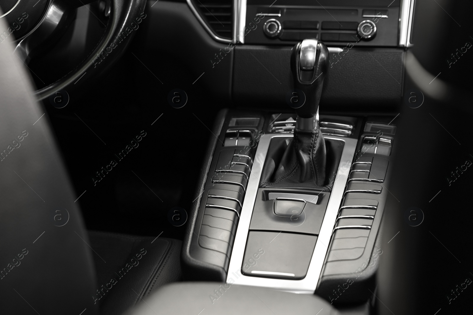Photo of Gear stick inside of modern black car