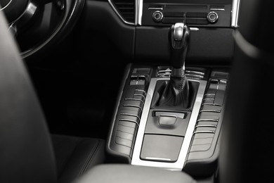 Photo of Gear stick inside of modern black car