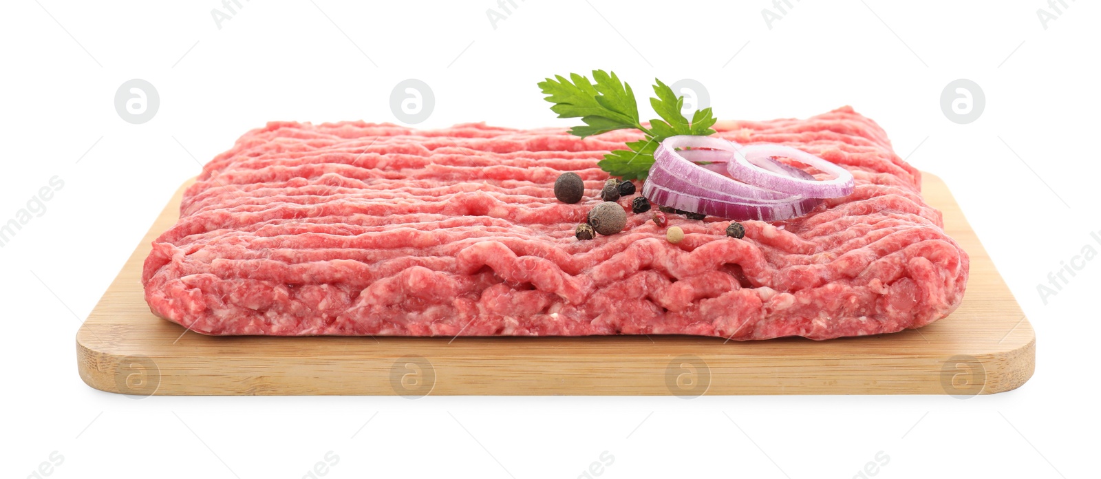 Photo of Board with raw ground meat, onion, peppercorns and parsley isolated on white