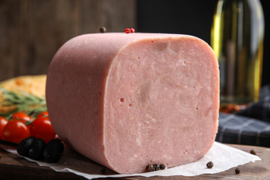Photo of Piece of tasty fresh ham on table, closeup
