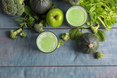 Photo of Flat lay composition with healthy detox smoothie and ingredients on wooden background