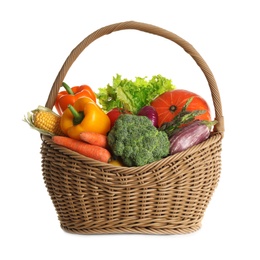 Wicker basket with fresh vegetables on white background
