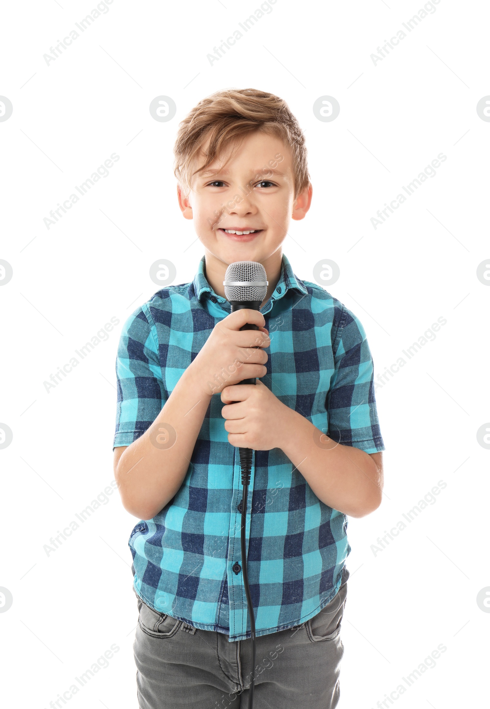 Photo of Cute boy with microphone on white background