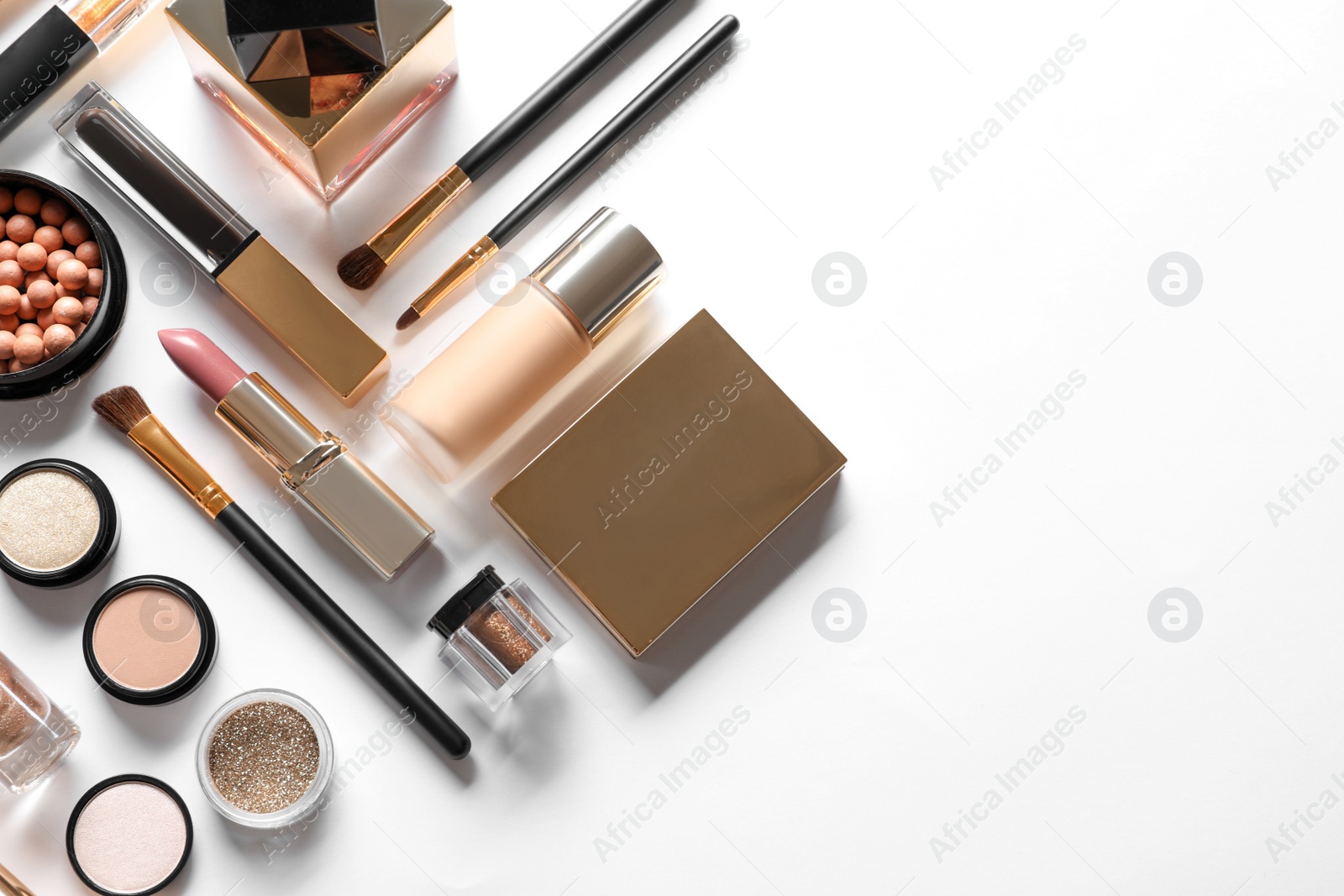 Photo of Set of luxury makeup products on white background, flat lay