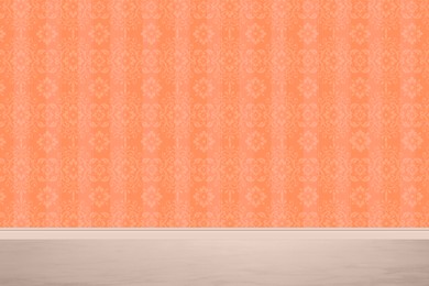 Orange wallpaper with pattern and white floor in room