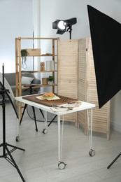 Photo of Tasty sandwich on table in photo studio. Food photography