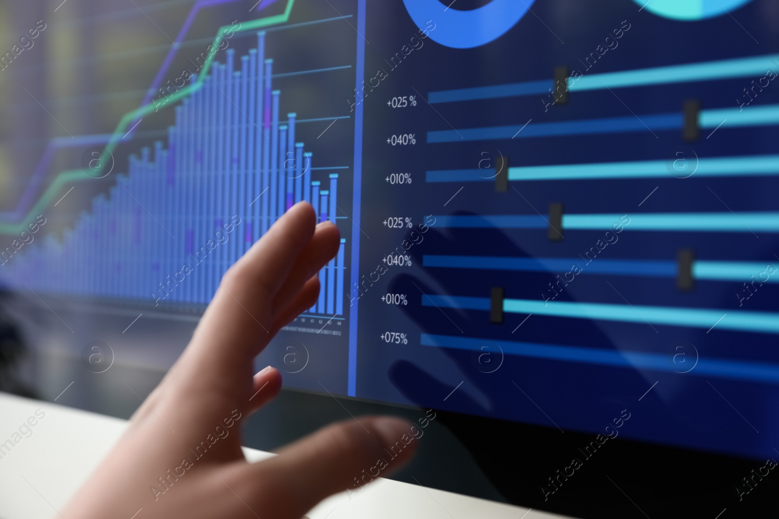 Photo of Woman working with statistic information on screen, closeup