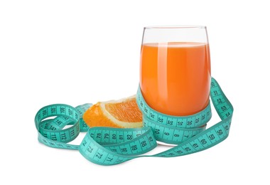 Photo of Tasty orange shake, piece of fresh fruit and measuring tape isolated on white. Weight loss