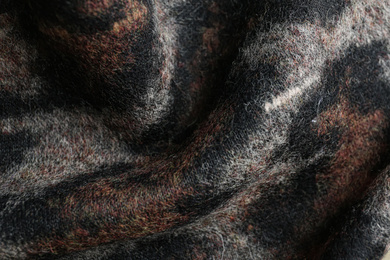 Photo of Texture of beautiful fabric with animal pattern as background, closeup