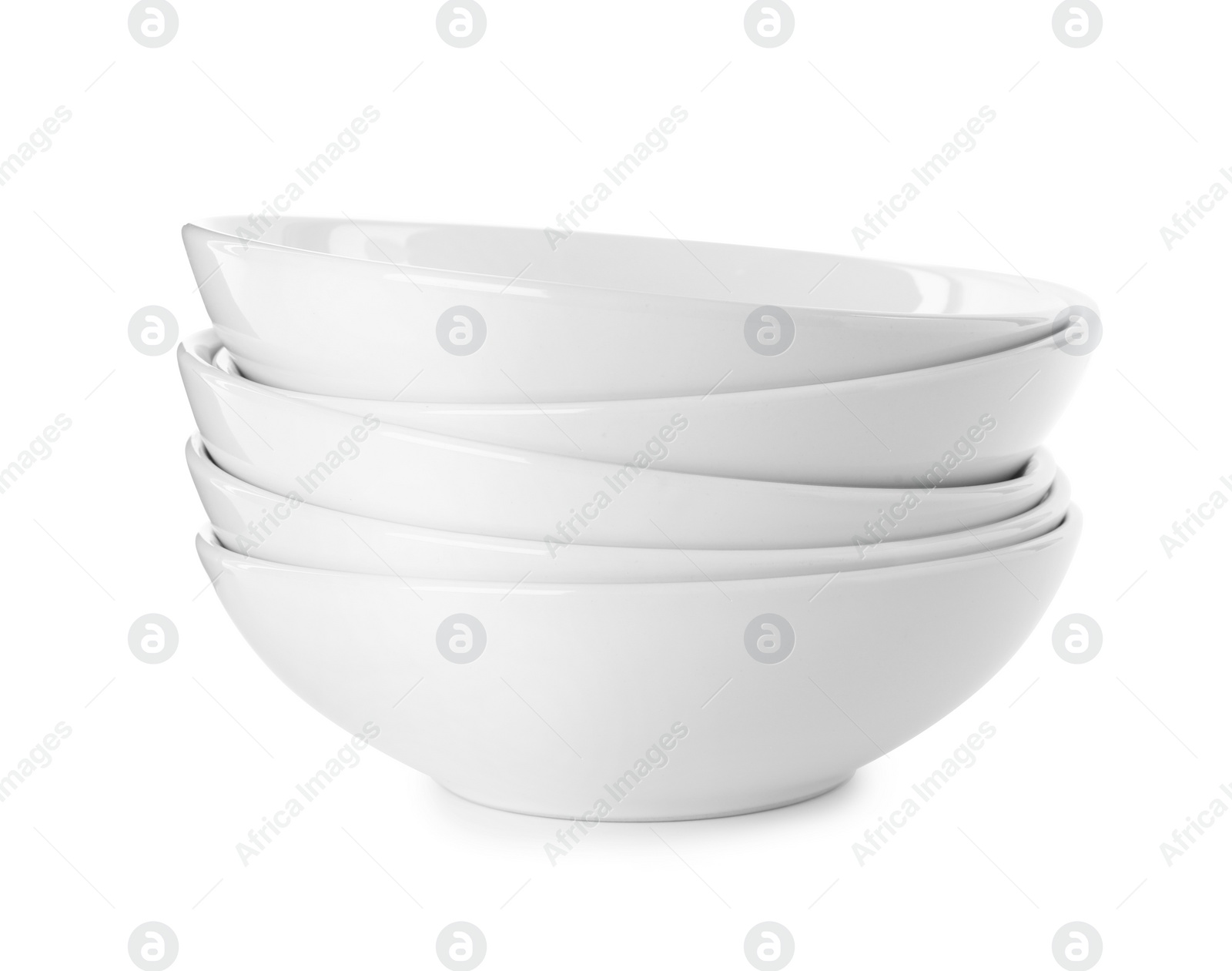 Photo of Stack of clean bowls isolated on white