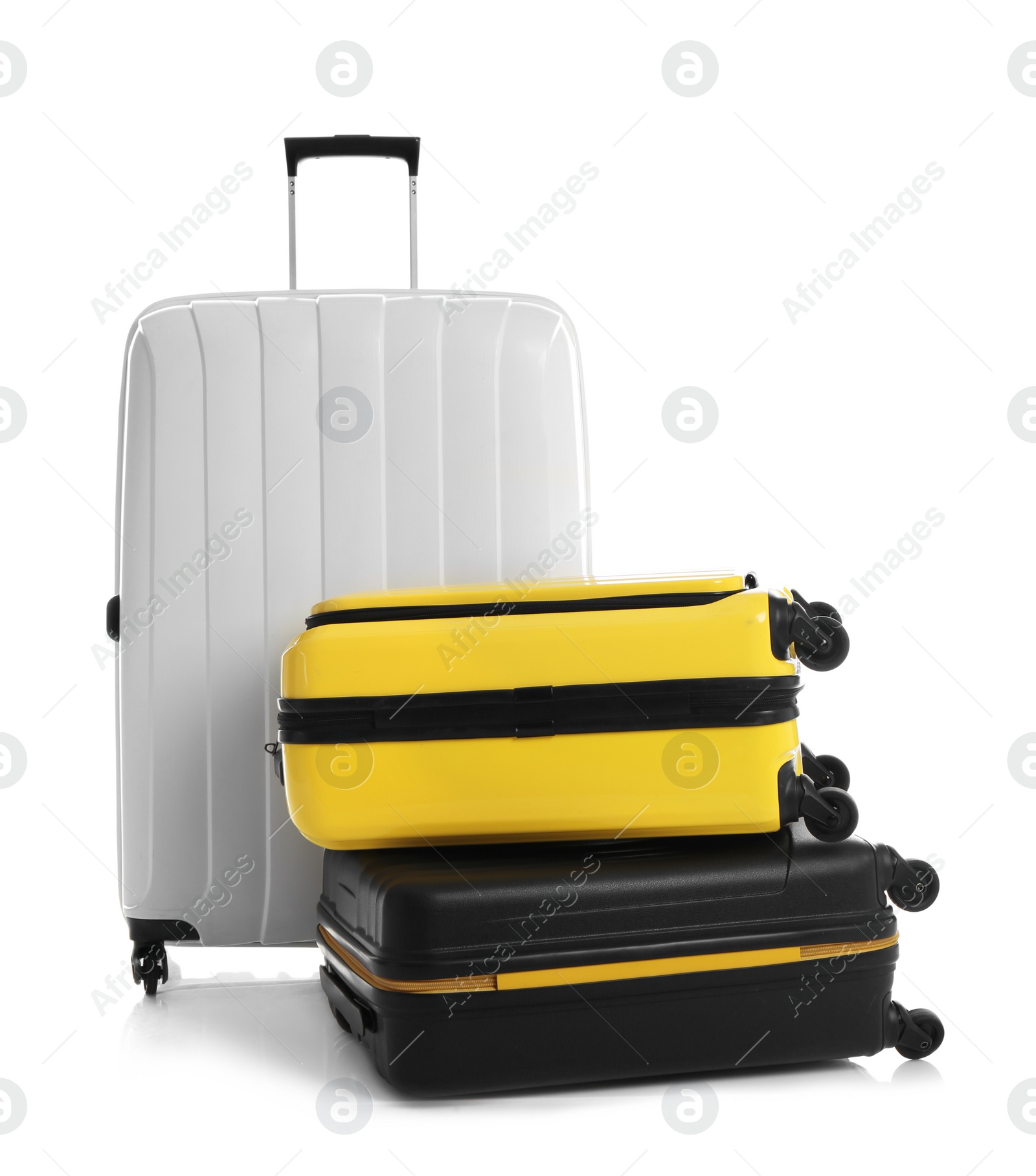 Photo of Modern suitcases for travelling on white background