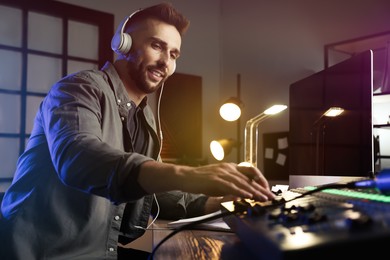 Man working as radio host in modern studio