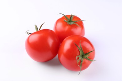 Photo of Fresh ripe red tomatoes on white background