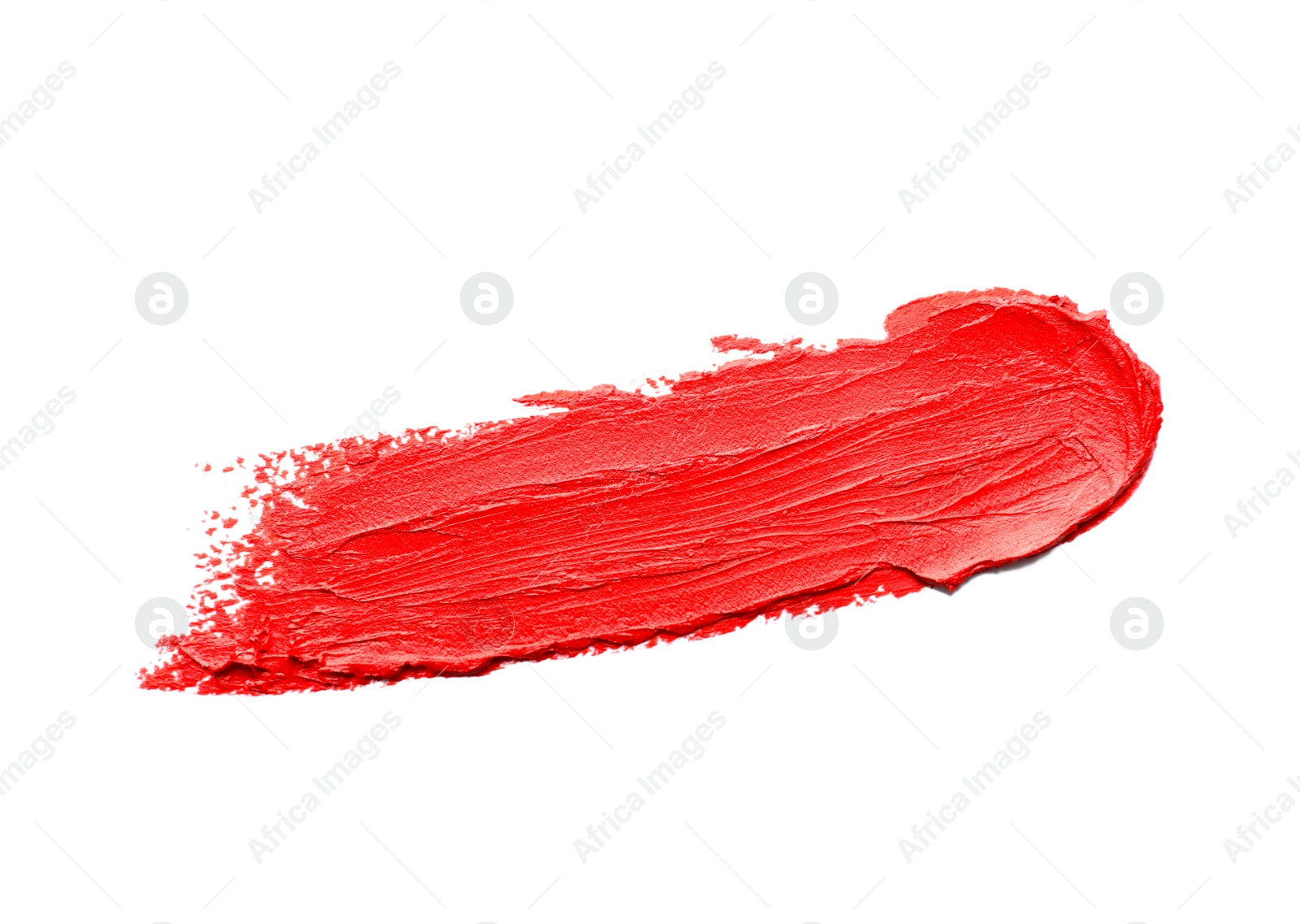 Photo of Stroke of lipstick on white background, top view