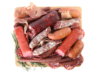 Different types of sausages with rosemary on white background, top view
