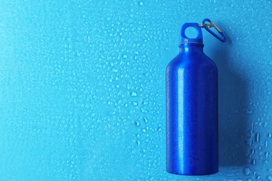 Photo of Sports water bottle on color background. Space for text