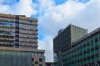 Photo of Exterior of beautiful buildings against blue sky