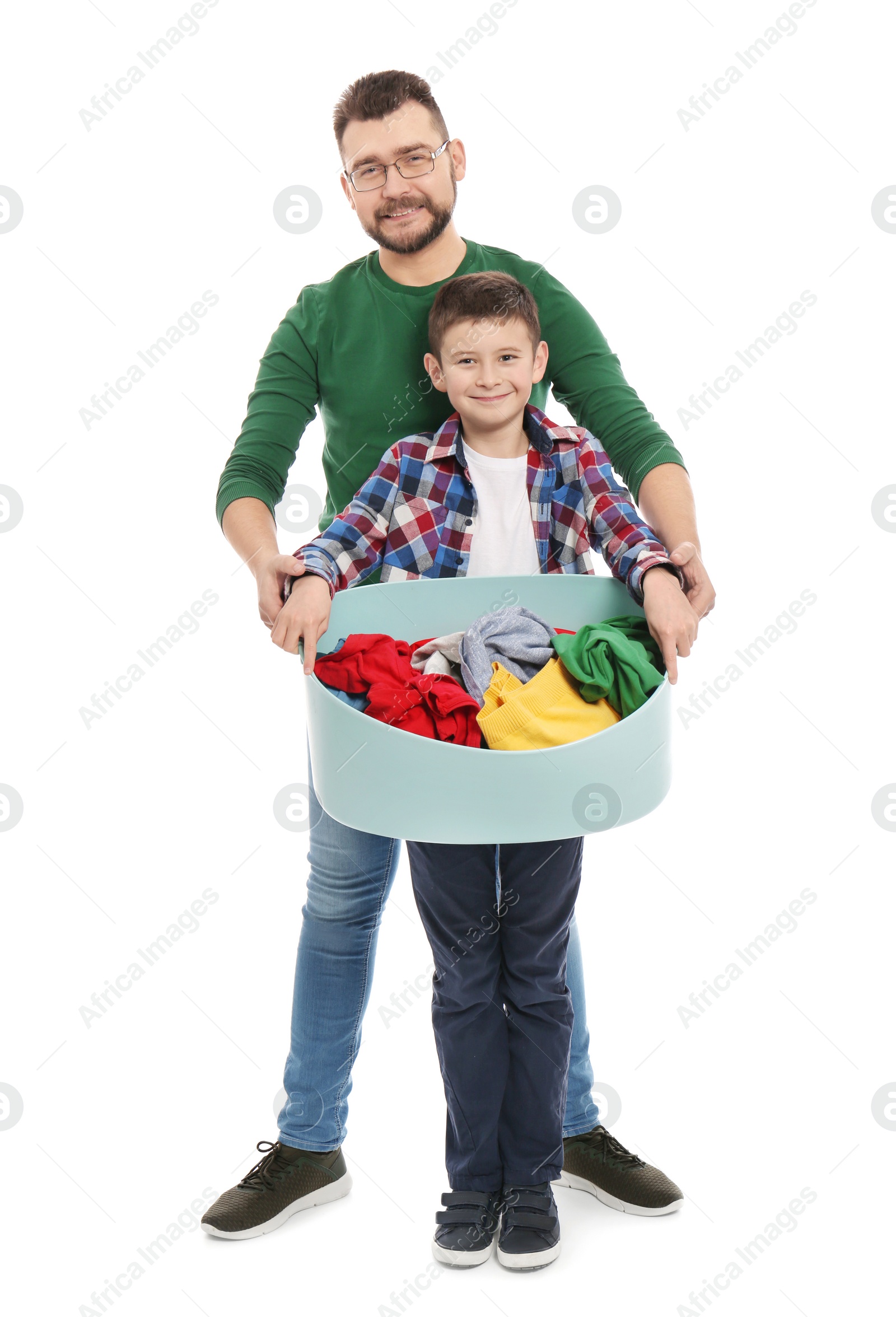 Photo of Little boy and his dad with laundry basket on white background