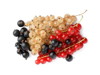 Photo of Fresh red, white and black currants isolated on white, top view